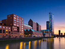 Rotterdam, Netherlands. View Of The City Center. Cove And Pier For Boats And Ships. Panoramic View. Cityscape In The Evening. Skyscrapers And Buildings.