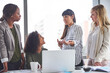 © Camerene P/peopleimages.com - Giving your opinion is the right step to take in business. Cropped shot of a group of businesswomen having a meeting in the office.