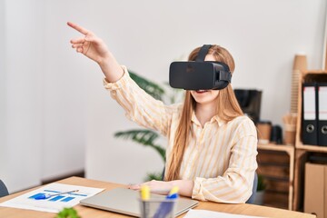 Canvas Print - Young blonde woman business worker using virtual reality goggles at office