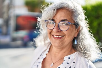 Poster - Middle age woman smiling confident standing at park