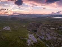 Aerial Sunset Of Comb Hill And Watlows Dry Valley Part Of The Limestone Landscape Near Malham Cove, Malham, North Yorkshire, UK