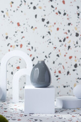Leinwandbilder - vase on white geometric pedestal on terrazzo background with summer sunlight