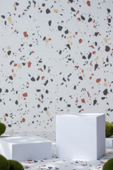 Leinwandbilder - White geometric pedestal on terrazzo background with summer sunlight and green moss rock