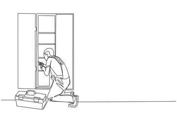 Wall Mural - Continuous one line drawing repair, maker or constructions of wood home furniture. Man carpenter is assembling of wardrobe or cabinet with shelves. Single line draw design vector graphic illustration
