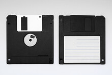 Black Floppy Disk For An Old Computer On A White Background