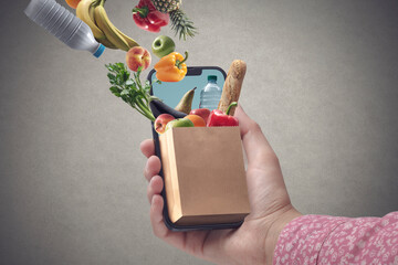 Wall Mural - Online grocery shopping app on smartphone