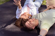 © qunica.com - Happy guy and girl spending time together in park enjoying each other’s company