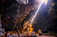 Golden Buddha In The Cave, Tham Luang Cave, Petchaburi Province, Thailand.
