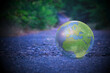 Erdball - Strasse - Ecology - Lensball -High quality photo  - Bioeconomy - A closeup of lensball with reflection planet on ground