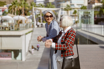 Wall Mural - Shot of adult modern women resting outdoors