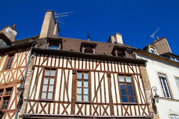 Wall Mural - Dijon, France, April 16, 2022. Typical facade of an old house.