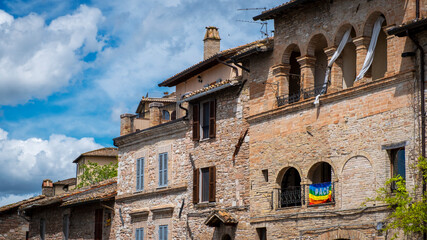 Wall Mural - Old palaces facades in the city of Assisi (Umbria Region, central Italy). Ancient medieval city, is world famous as birthplace of St. Francis, Italy's christian Patron.