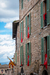 Wall Mural - Old palaces facades in the city of Assisi (Umbria Region, central Italy). Ancient medieval city, is world famous as birthplace of St. Francis, Italy's christian Patron.