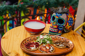 Mexican food in traditional offering of dia de muertos 