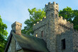Turret and chimney of Squires Castle, an old ruin, originally a gatehouse for a never-built main residence, stands in a park near Cleveland, Ohio.