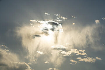 Wall Mural - Cloudscape clouds with a bright sun. Excellent for sky replacement.