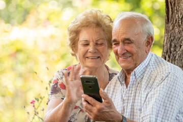 senior couple with mobile phone