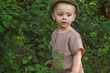 © meteoritka - Portrait of cute little boy outdoors.