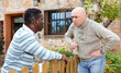 Quarrel of two neighbors in the country in the village. High quality photo
