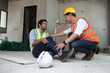 © sittinan - engineering team or worker team they are working at construction site and he accident