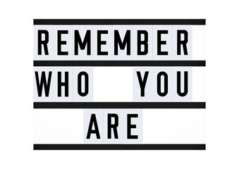 Wall Mural - Inspirational Remember Who You Are quote on vintage retro board. Concept. flat lay	