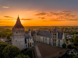 Poster - Sunset aerial view of Chateaudun  castle in Eure-et-Loire in France with imposing circular keep, Gothic high chapel, Renaissance residential palace and bell tower perched on a limestone outcrop