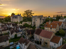 Aerial Sunset View Of Montresor Medieval Castle With A Renaissance Mansion In Indre Et Loire, On A Rocky Overhand Dominating The Valley, On Of The Most Beautiful Villages Of France