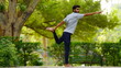 © FireFXStudio - international yoga day image boy doing yoga in various position at park