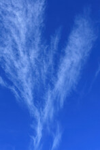 Blue Sky With Feathery White Clouds