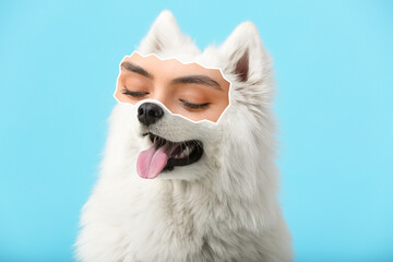 Wall Mural - Cute Samoyed dog with human eyes on light blue background