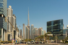 United Arab Emirates, Dubai, Busy Street In Business Bay District With Tall Skyscrapers In Background