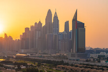 United Arab Emirates, Dubai, Tall Downtown Skyscrapers At Sunset