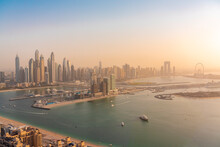 United Arab Emirates, Dubai, View Of Coastal City At Sunset