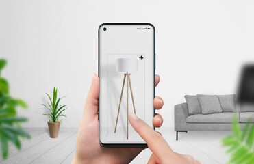 Wall Mural - buying furniture with augmented reality app concept. woman sets up a lamp in her living room with sm