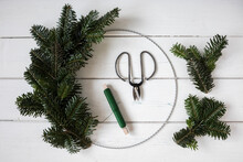 Making Of Wreath With Wire, Thread And Spruce Twigs