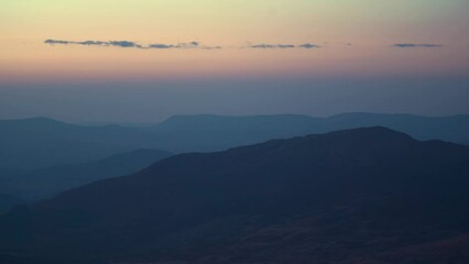 Wall Mural - Static aerial view over the mountains of North Wales at dawn