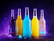 assorted soda pop glass bottles. sweet citrus and fruit iced carbonated lemonades, purple background backlight
