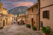 © robertharding - View of shop on the Calvary Steps in the old town of Pollenca, Pollenca, Majorca, Balearic Islands