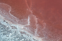 Pink Healing Salt. Shoreline Or Water Edge With Salt On The Shore Of Pink Lake. Water Surface. Design Element