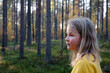 © Olga Kazanovskaia  - Blonde girl in a forest, side view portrait, autumn nature, copy space
