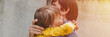 © Ksenia - man dad having quality time with their kid son boy six year old hug on arms. happy father playing together child. real life authentic day-to-day fatherhood moments. fatherly love care. banner. flare