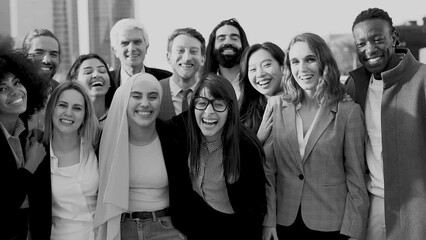 Wall Mural - Multiracial business people hugging each other outside of office building while celebrate success
