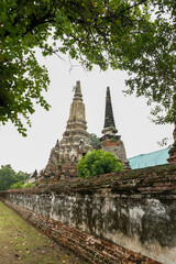 Old pagodas and old brick wall at Wat Phutthaisawan in Sampao Lom subdistrict,Phra Nakorn Sri Ayutthaya ,Thailand.