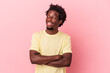 © Asier - Young african american man isolated on pink background smiling confident with crossed arms.