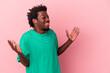 © Asier - Young african american man isolated on pink background joyful laughing a lot. Happiness concept.