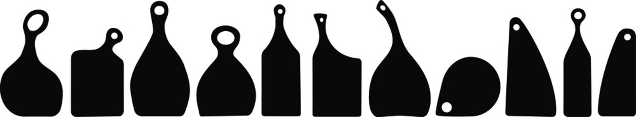 black wooden cutting boards of various unusual shapes. Applicable as a separate object for the background and for combination with any objects .  Made without background eps10 vector illustration