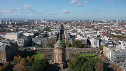 Canvas Print - Autumn aerial cityscape of Mannheim city, Baden-Württemberg, Germany. Friedrichsplatz with the Mannheim Water Tower (Wasserturm) in the foreground