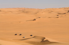 High Angle View Of 4x4 Vehicles In A Desert, Erg Awbari, Fezzan, Libya