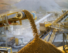 Close Up Of Conveyor Belt Moving Rocks In Quarry