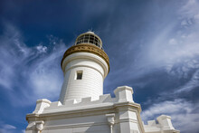 Close Up Of Byron Bay Lighthouse Towering Into The Blue Sky Above